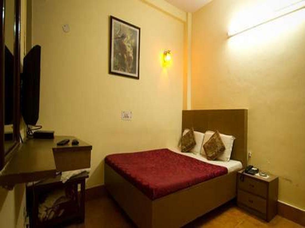 Hotel Woodland Deluxe New Delhi Kamer foto